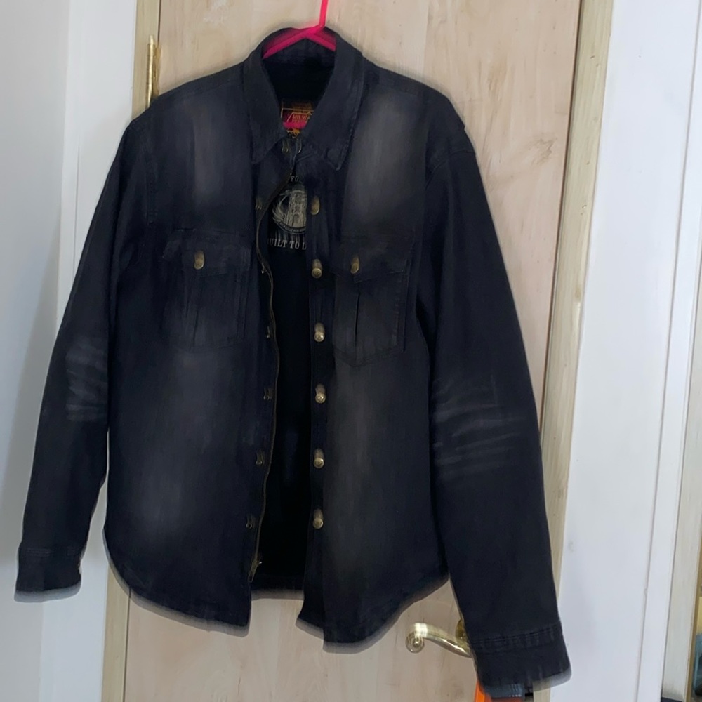 Milwaukee Flannel shirt. Size L Shoulder and elbow armor